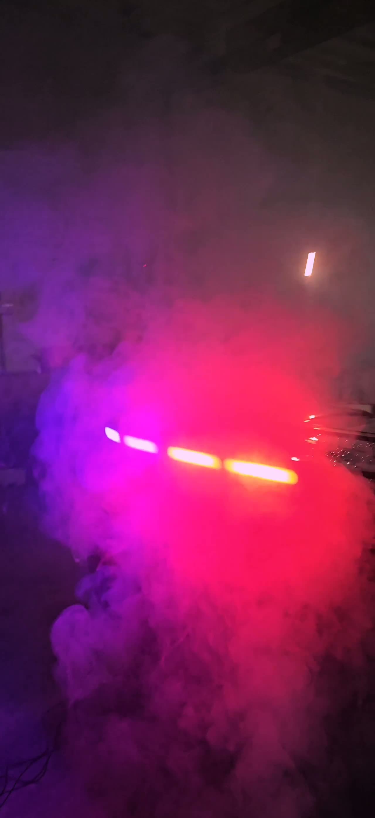 Smoke machine lighting setup — behind the scenes still