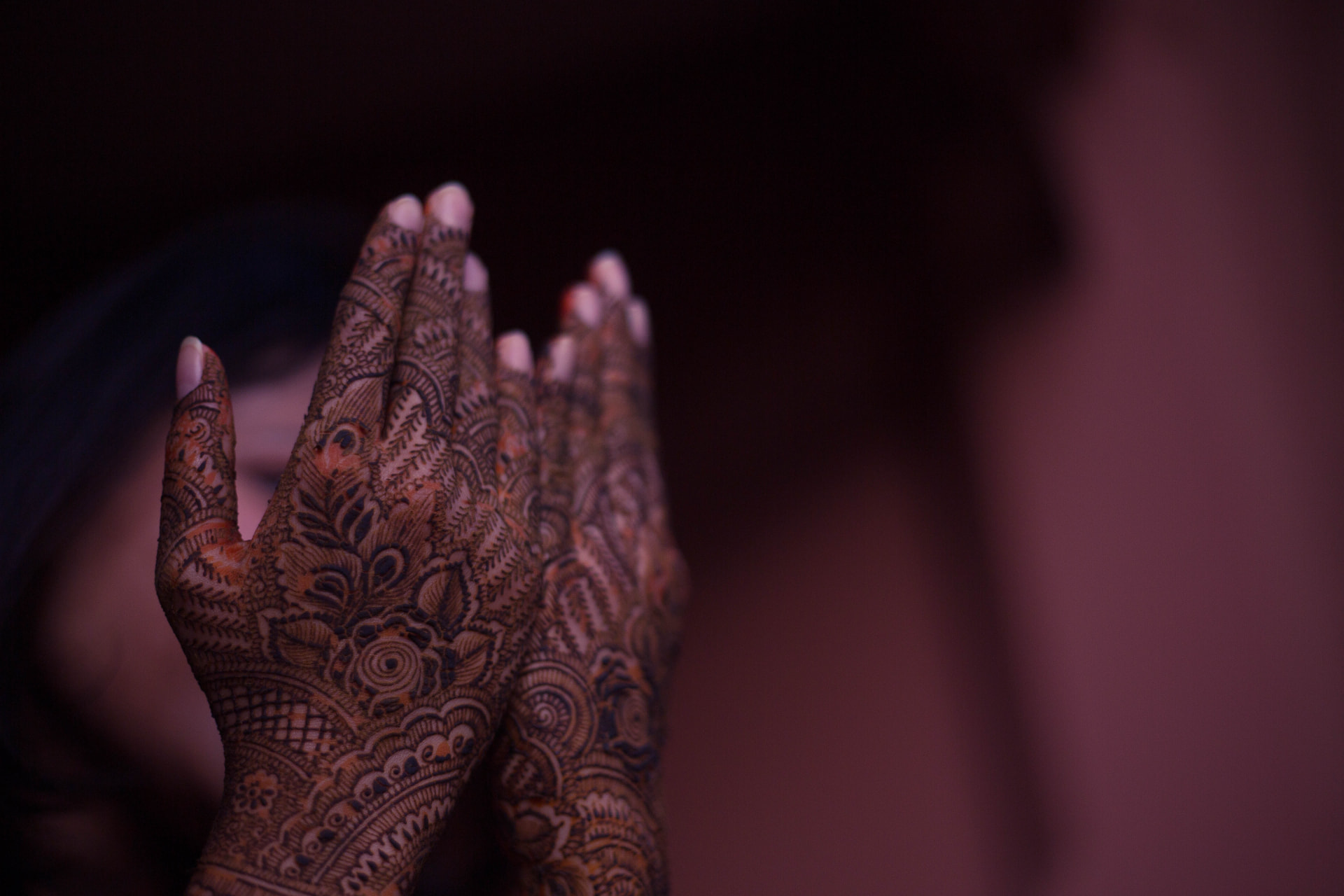 Bridal mehndi detail on the bride's hands