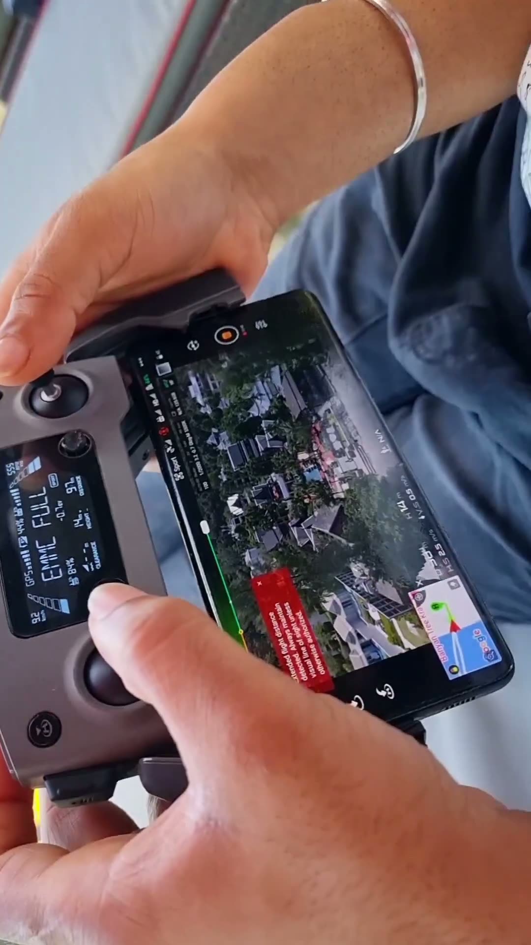 Vertical aerial city rise, drone — video still