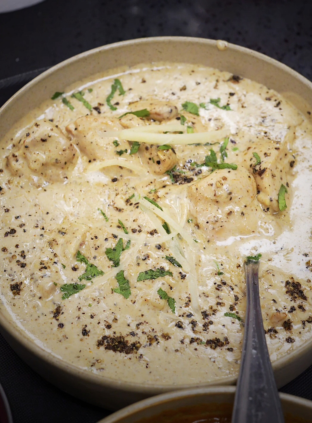 Kali mirch chicken — a slow, peppery cream